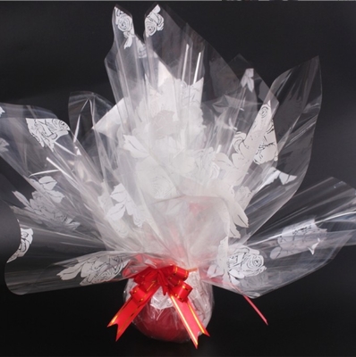 Ein guter Preis. Weihnachten Weihnachtsfruchtverpackungspapier, Blumenverpackung, durchsichtiges Cellophane, englisches herzförmiges 70#-Bouquet-Geschenkverpackungspapier Online