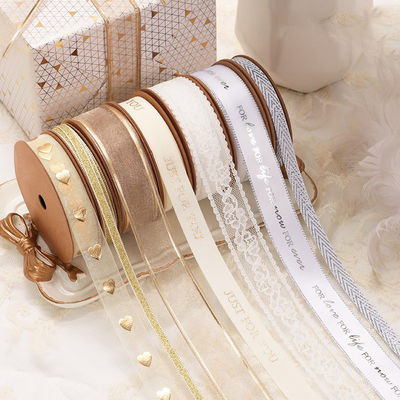 kaufen Weihnachtsgeschenk Dekoration Schnee Seidenband 520 in goldenem Polyester Gold und Silber Seide Online-Herstellung