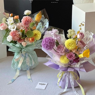 Blumenliebe, Volkstag, kleine Spitze, Zellophan, Spitze, Wasserbeutel, Blumenpapier, Blumenladen, beliebtes Blumenstrauß Verpackungsmaterial