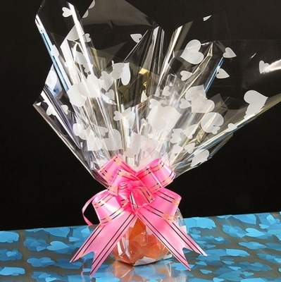 Ein guter Preis. Herzförmig gedruckte Cellophane, Apfelpapier, Blumen-, Obst- und Weihnachtsfrüchteverpackungspapier, DIY-Artikel für Weihnachtsnacht und Weihnachten Online