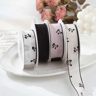 Ein guter Preis. Schmetterlingsdruck Schnee Band Haarzubehör DIY Bogen Blumenzubehör Geschenkbox Verpackung Bogen Flocking Schnee Band Online