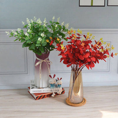 Ein guter Preis. Simulierte Eukalyptusgroßhandel Hochzeitsschmuck Blumenarrangement im Freien gefälschte Blume 16 Gabel Eukalyptusblatt Handblutkuchen mit Blumen Online